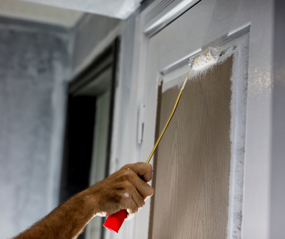 rolling paint on a door 